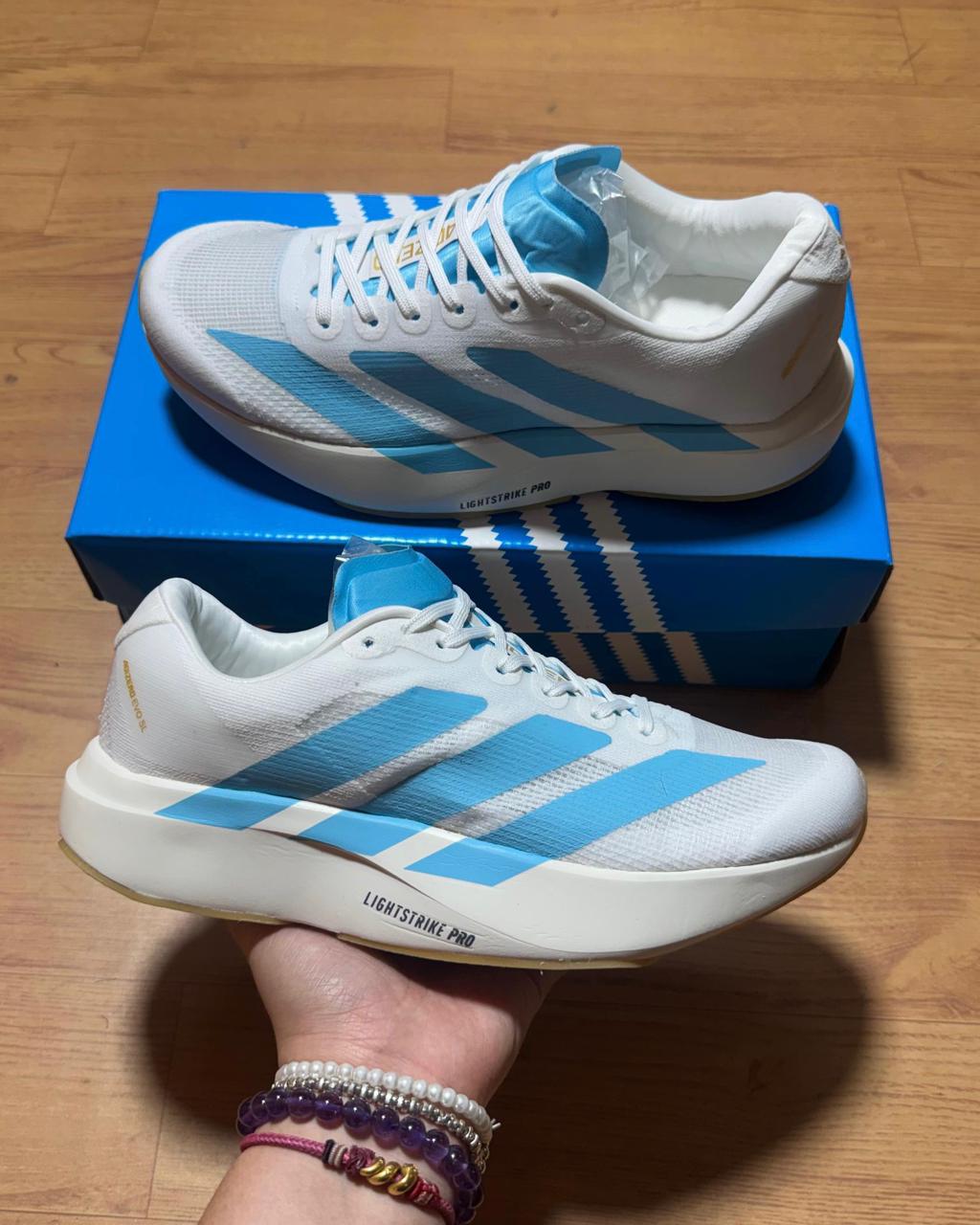 Adizero Evo SL Branco com azul