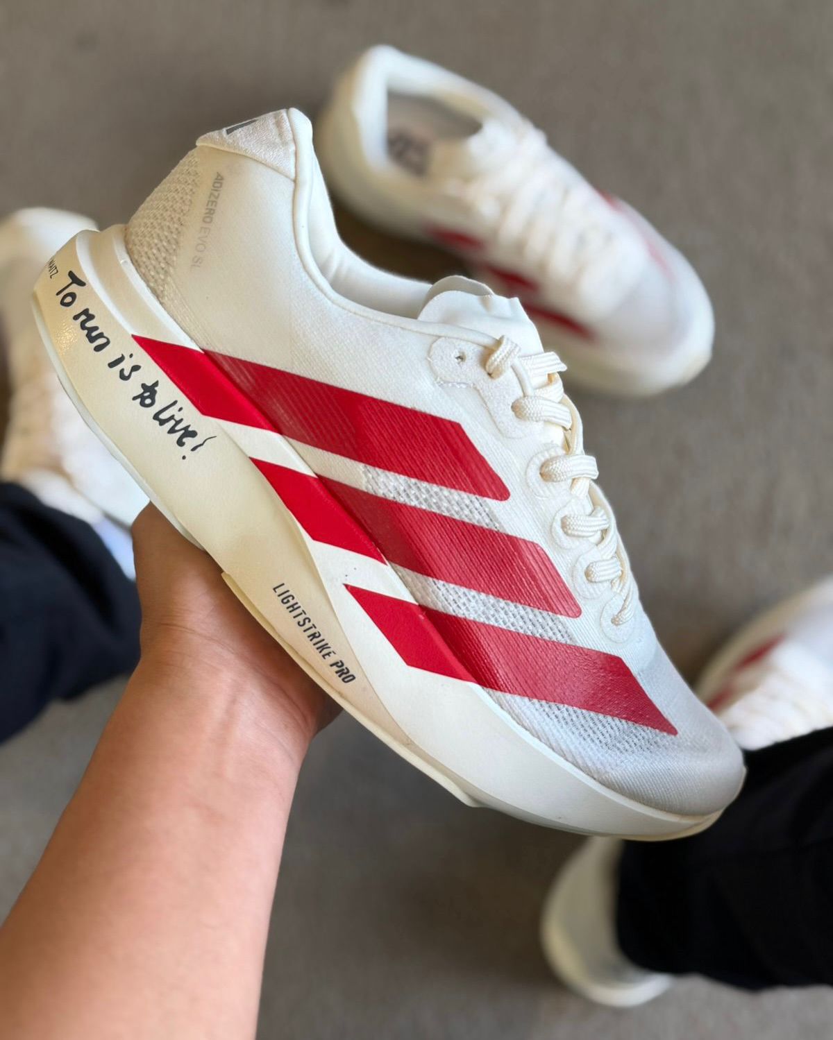Adizero Evo SL Branco red